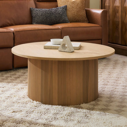 ORIAN – Oak Brown Round Coffee Table with Textured Reed-Style Base | P199