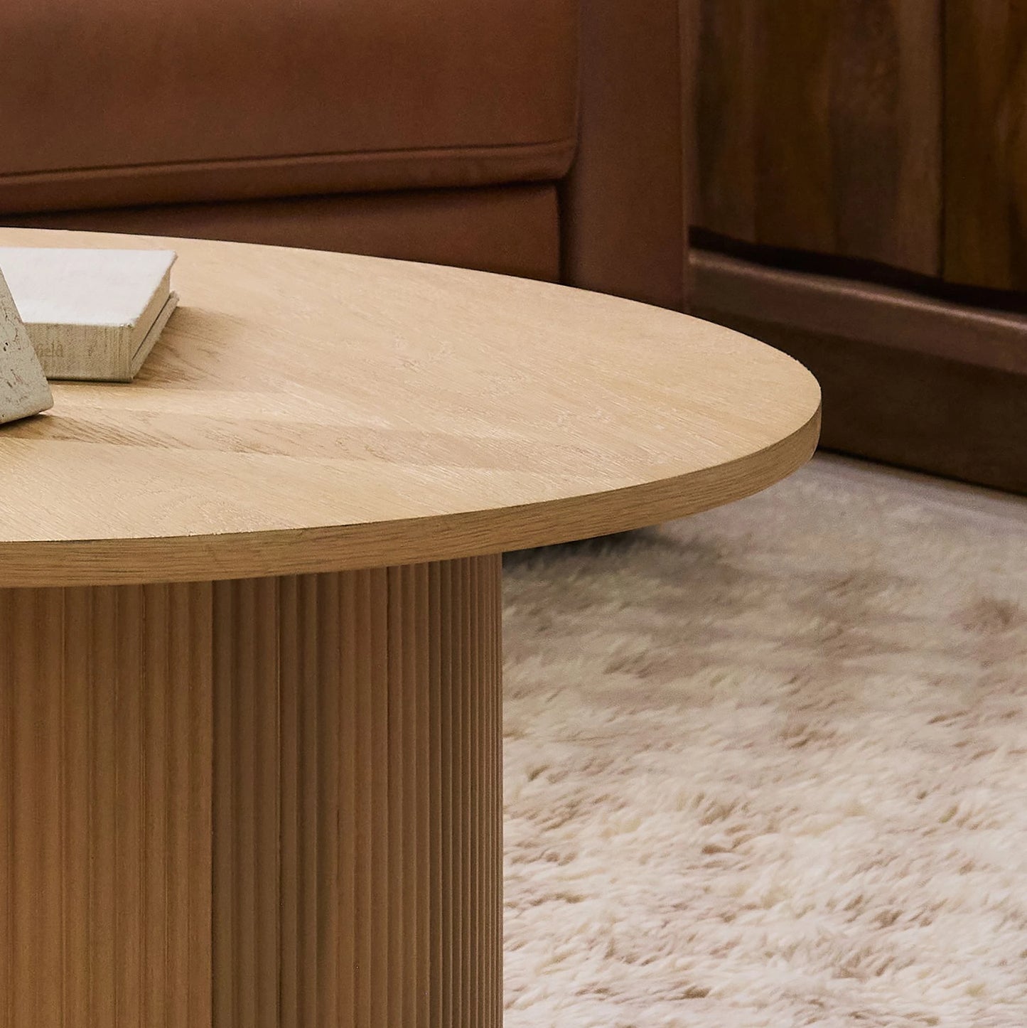 ORIAN – Oak Brown Round Coffee Table with Textured Reed-Style Base | P199